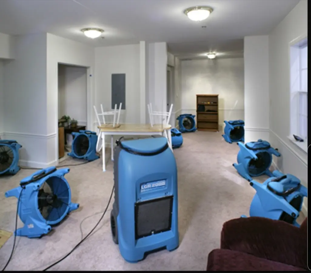 Air movers and dehumidifier setup for Water Damage Restoration in South Lyon